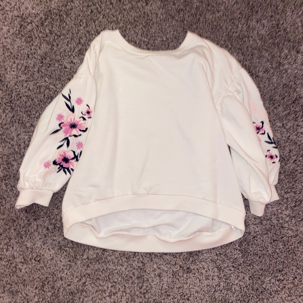 Girls top with floral detail on sleeves